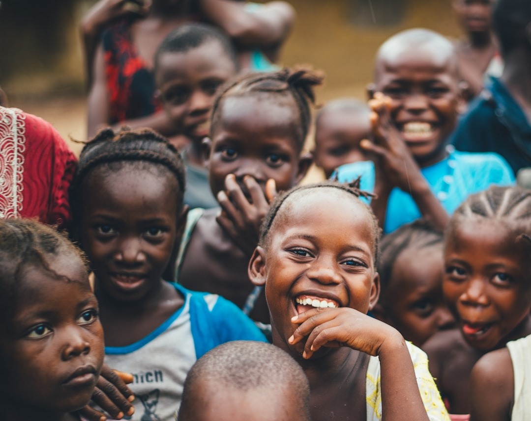 A group of children smiling together
