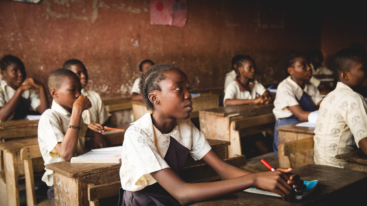 Programs & Training Pupils learning together in a classroom